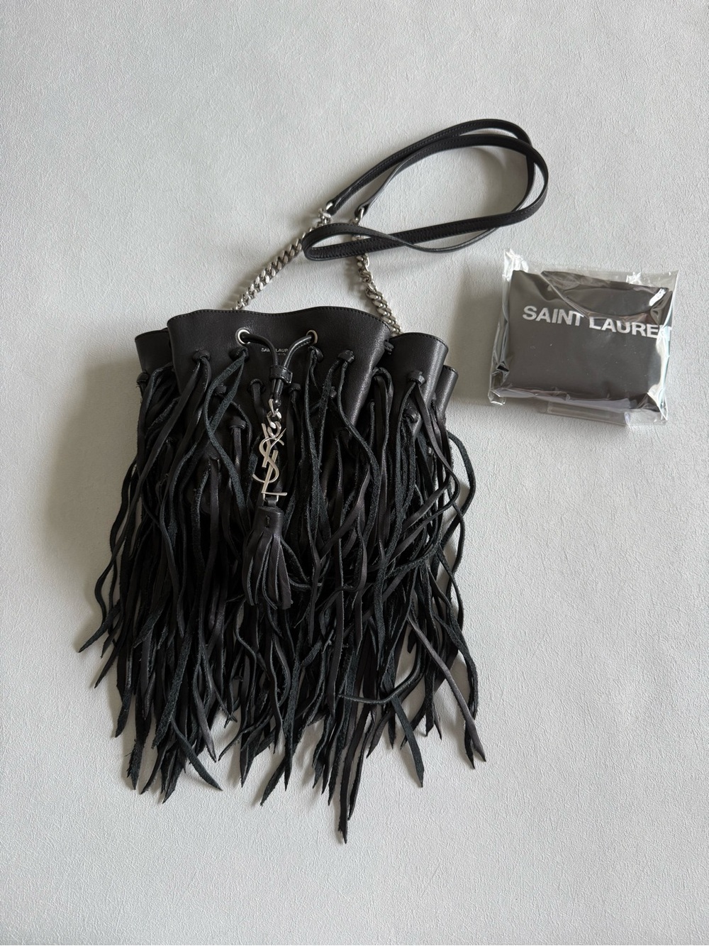 Saint Laurent Black Fringe Drawstring Bucket Crossbody Bag with Silver Chain